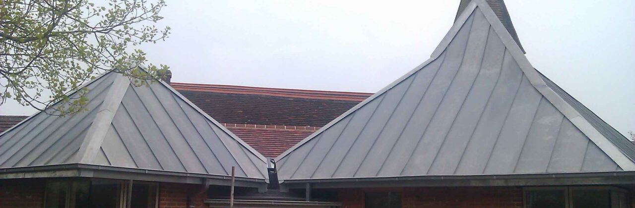 Two zinc pyramids on church extension in Sussex